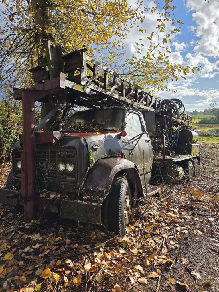 Old machinery pickup of a vintage drilling rig truck in Surrey